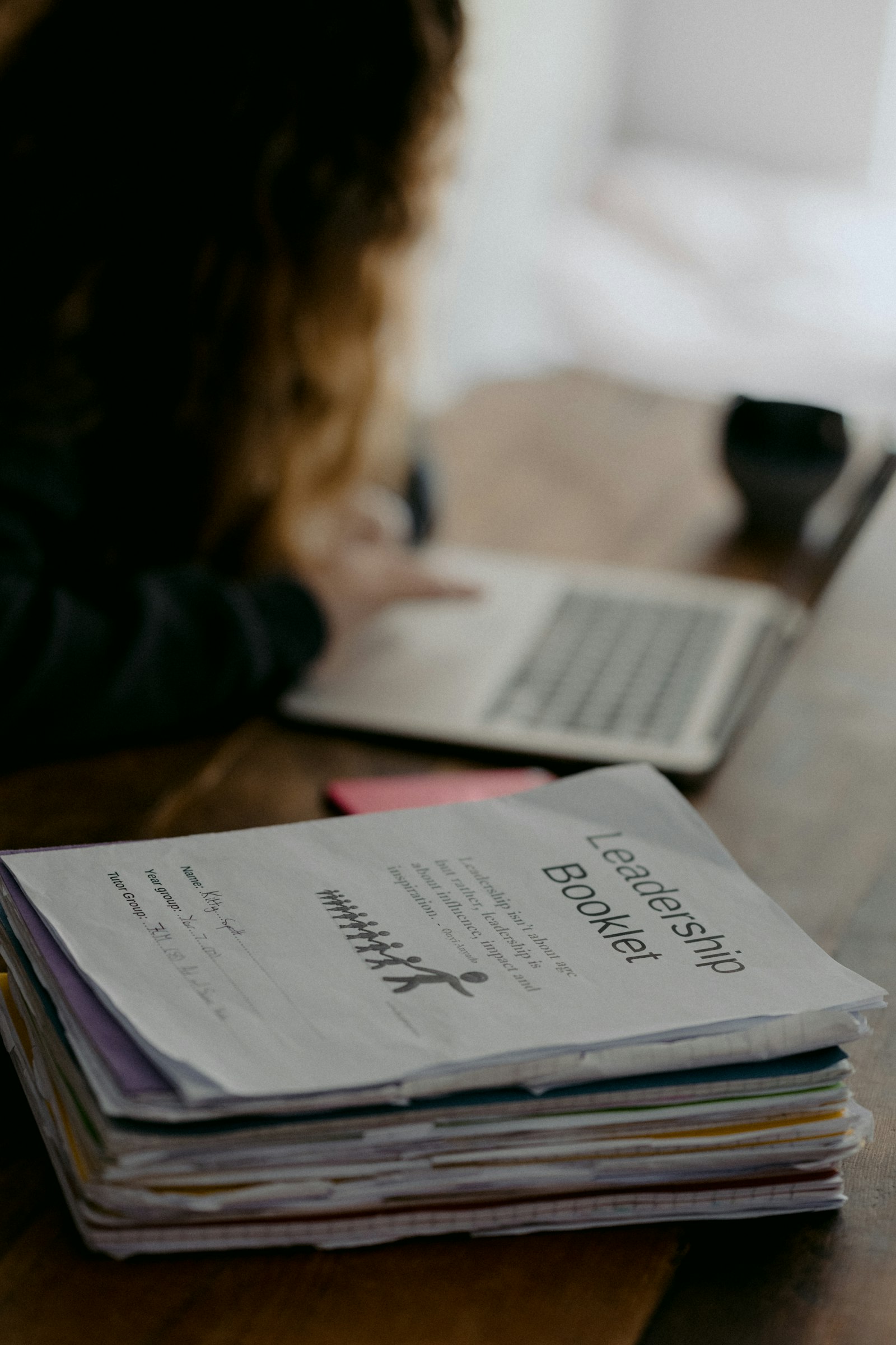 Student reviewing material at a desk